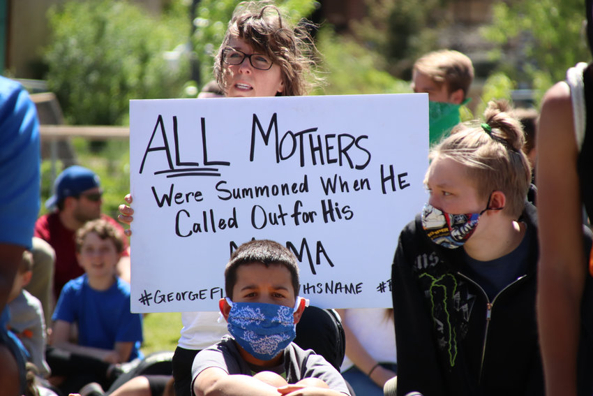 Protesters marched through downtown Castle Rock on June 7 before the crowd gathered in Festival Park so people of color could share their stories.